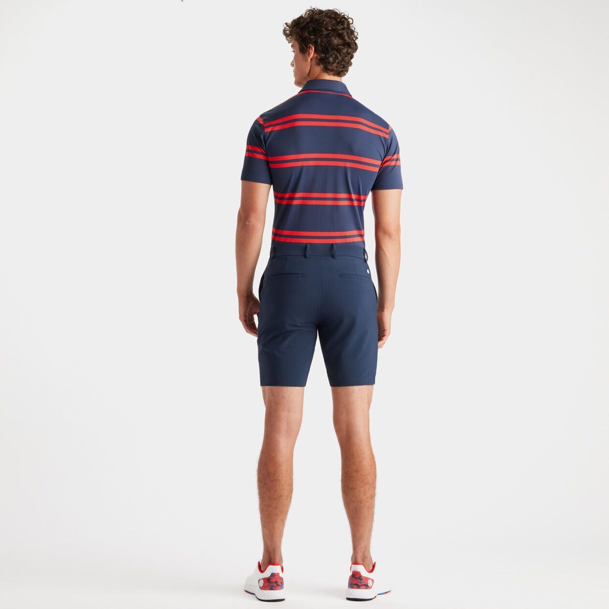 Polo da uomo slim fit in piqué tecnico a righe offset GFORE